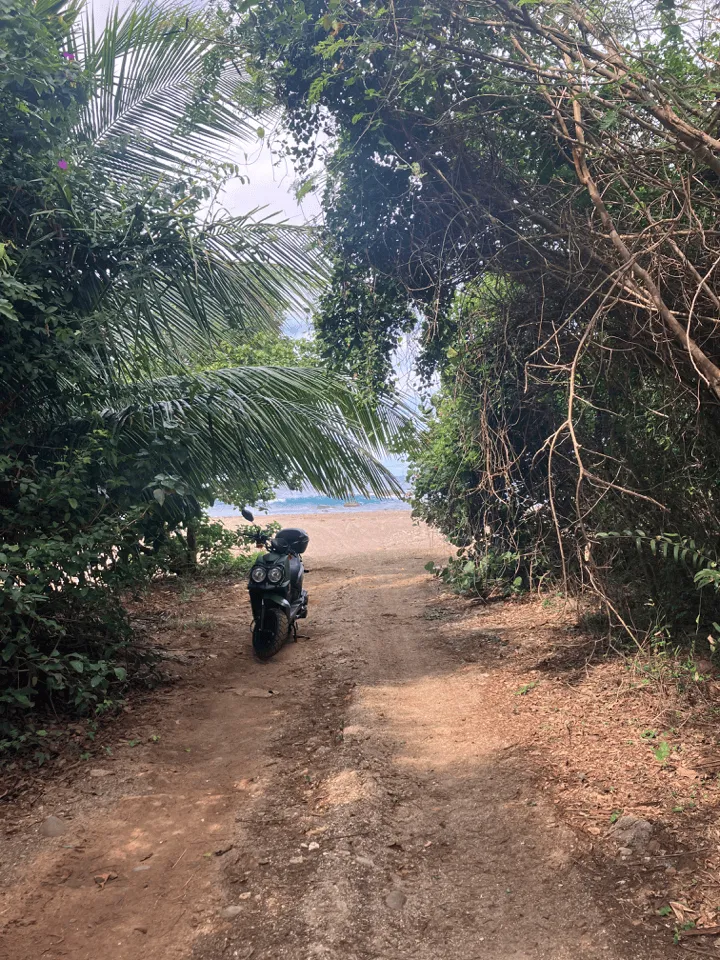 Moped by beach at Bordeaux Bay